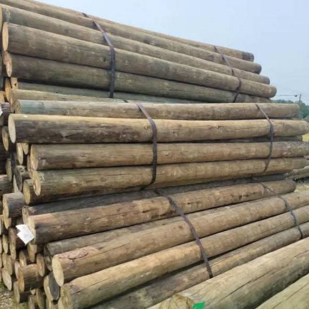 Treated transmission poles